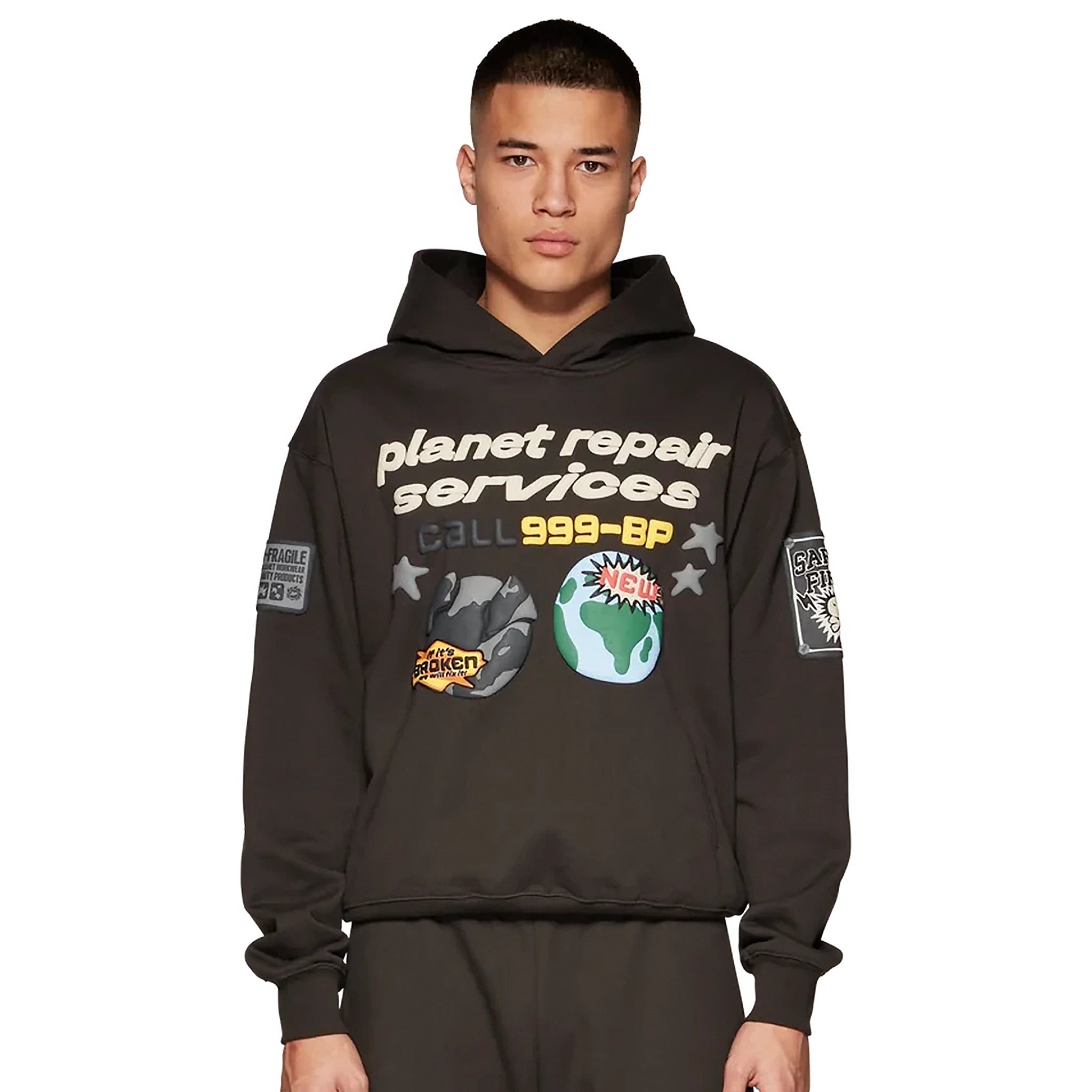 Model front view of Broken Planet Repair Services Soot Black Hoodie